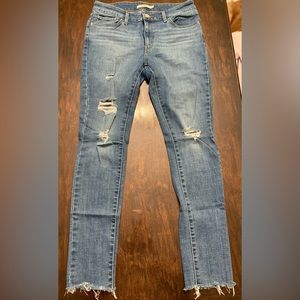 Levis 711 skinny with rips